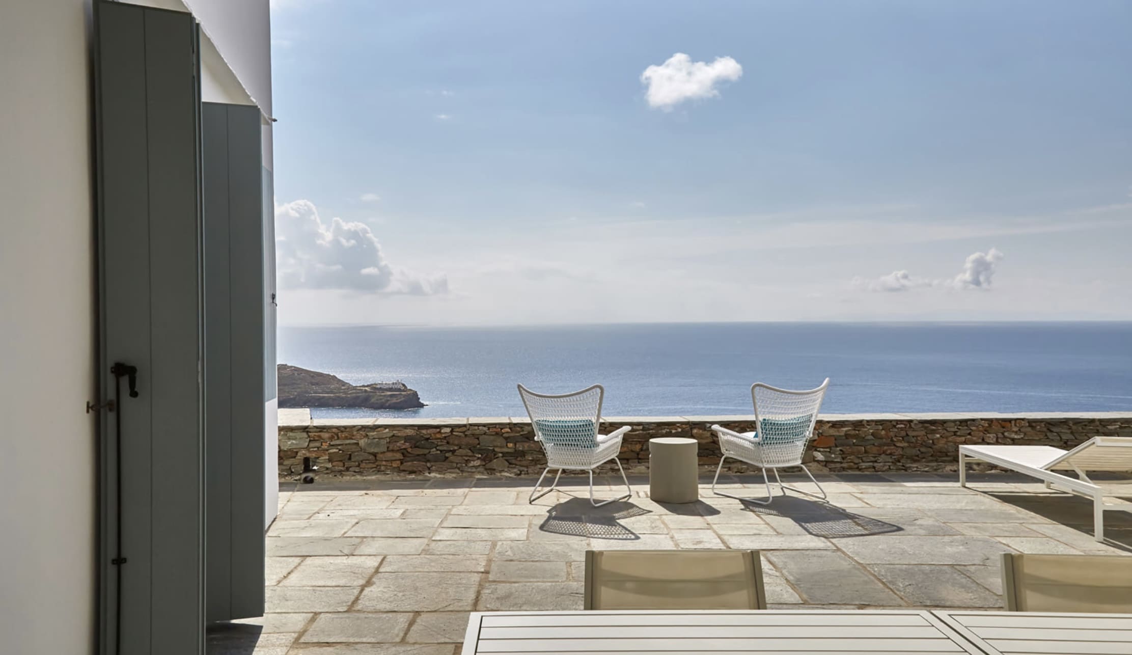 looking out over hilltop villa into the sea in greece yoga retreat